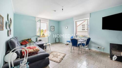 Wohnzimmer 1 - Gemütliche 1-Zimmer-Wohnung mit Tageslichtbad und Stellplatz