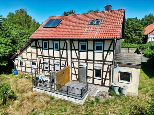 Außenansicht Gartenseite - 8 Zimmer Mehrfamilienhaus, Wohnhaus zum Kaufen in Dahlum