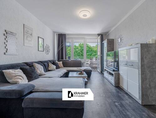 Wohnzimmer - Moers-Asberg: Freundliche, vermietete Eigentumswohnung mit Loggia und Blick ins Grüne