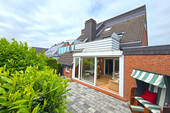 Innenhof mit Wintergarten - 2 Zimmer Terrassenwohnung in Westerdeichstrich