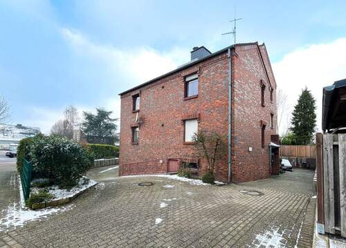 Außenansicht Einfahrt - 2 Zimmer Etagenwohnung zum Kaufen in Ibbenbüren