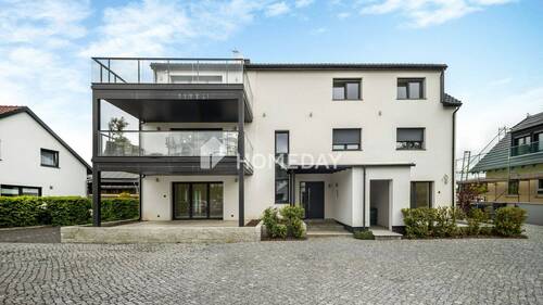 Außenansicht 1 - Großzügig & modern: 149?m² EG-Wohnung mit 3 Terrassen, 2 Stellplätzen - sofort bezugsfrei