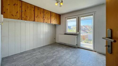 Schlafzimmer mit Zugang zum Balkon - 