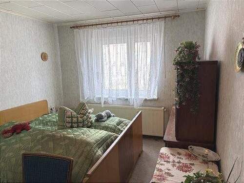 Schlafzimmer Nebengebäude mit Gästewohnung - 