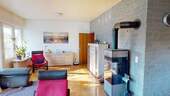 Wohnzimmer Kamin - Einfamilienhaus mit 172,00 m² in Biedenkopf zum Kaufen