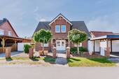 Bild 1 - Einziehen und wohlfühlen - Top gepflegtes Einfamilienhaus mit herrlichem Garten.