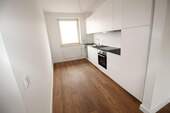 Küche mit Einbauküche - Etagenwohnung mit 83,00 m² in Glücksburg zur Miete