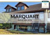 MARQUART IMMOBILIEN - Freistehendes Zweifamilienhaus mit viel Platz in ruhiger Lage