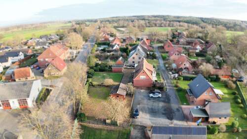 Luftaufnahme Wohngebiet - Einfamilienhaus mit 140,00 m&sup2; in Bramsche zum Kaufen