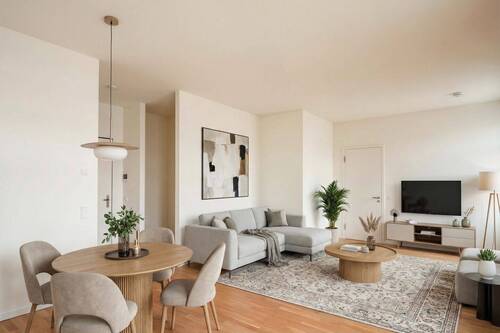 Wohn- und Essbereich mit Einrichtungsbeispiel - Moderne 3-Zimmer-Neubauwohnung im 2. Obergeschoss