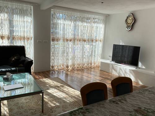 Wohnzimmer - Einfamilienhaus mit 190,00 m² in Rosenheim zum Kaufen