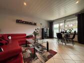 Wohnzimmer - Terrassenwohnung mit 65,60 m² in Harsefeld zum Kaufen