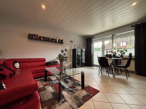 Wohnzimmer - Terrassenwohnung mit 65,60 m² in Harsefeld zum Kaufen