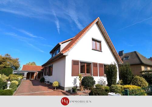 Verkauf Wohnhaus Weyhe - H&T Immobilien - Wohnhaus mit Einliegerwohnung und Gartenidylle in Weyhe