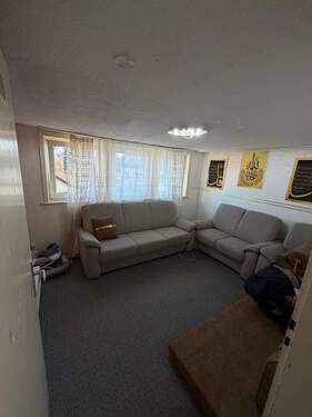 Wohnzimmer - 3-Zimmer-Wohnung in Viennenburg