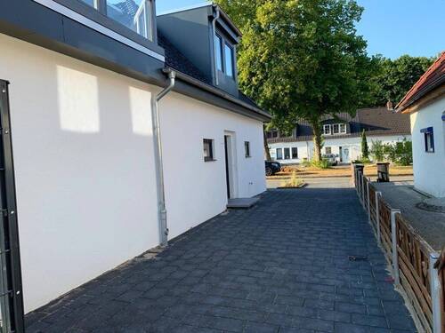 Außenansicht Seite - Reihenendhaus mit 90,00 m&sup2; in Bremen zur Miete