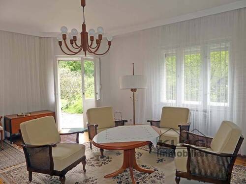 Wohnzimmer mit Ausgang zur Ter - 
