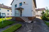 Einfahrt - Mehrfamilienhaus, Wohnhaus mit 126,00 m² in Wernau zum Kaufen