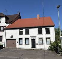 Solides Ein- bis Zweifamilienhaus in zentraler Lage von Großrosseln mit Gestaltungspotenzial