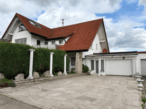 Außenansicht - Stilvolle Erdgeschosswohnung mit zwei überdachten Terrassen und mediterranem Wohnflair
