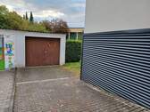 Einfahrt zur Garage und Garten - 
