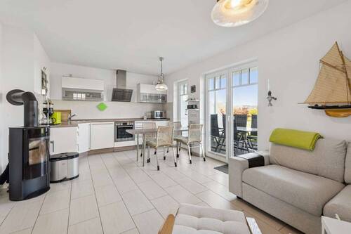 Küchen- und Wohnbereich - 3 Zimmer Etagenwohnung in Börgerende-Rethwisch