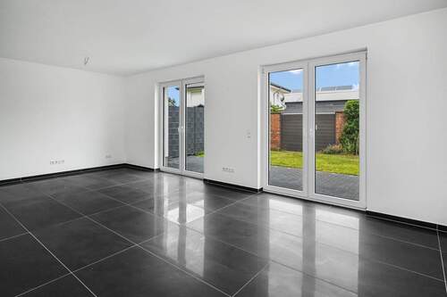 Wohn- und Esszimmer - 5 Zimmer Doppelhaushälfte zum Kaufen in Bohmte