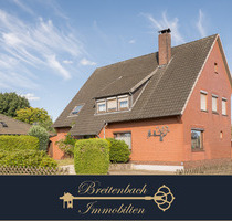 Sottrum . Charmantes Einfamilienhaus mit zwei Wohneinheiten & großzügigem Garten