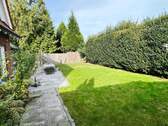 Blick in den pflegeleichten Garten - Einfamilienhaus mit 125,10 m² in Greven zum Kaufen