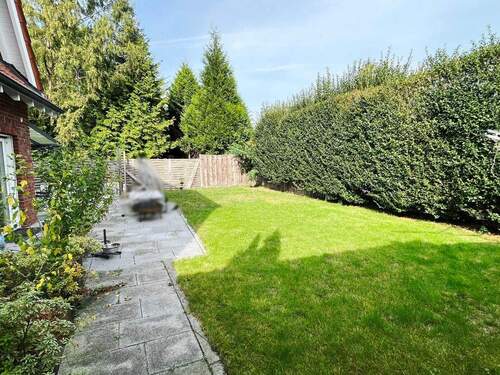 Blick in den pflegeleichten Garten - Einfamilienhaus mit 125,10 m² in Greven zum Kaufen