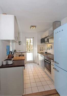 Offener Küchenbereich mit hochwertigen Geräten (Miele, SMEG etc.) - 