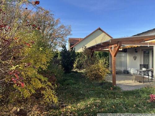 Blick in den Garten - Einfamilienhaus mit 91,00 m² in Hoppegarten zum Kaufen