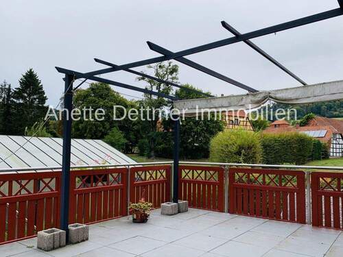 Balkon mit Treppe zum Garten - 