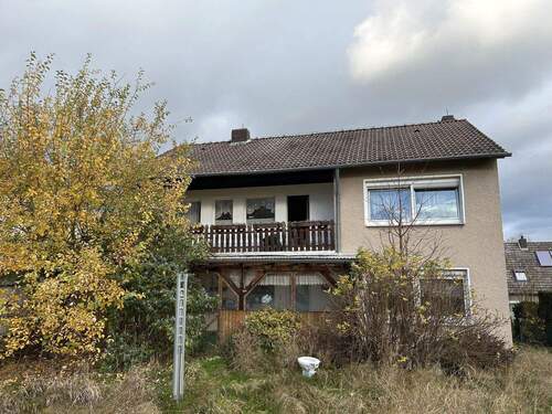 Rückansicht - Für Macher: Zwei Wohnungen in einem Haus