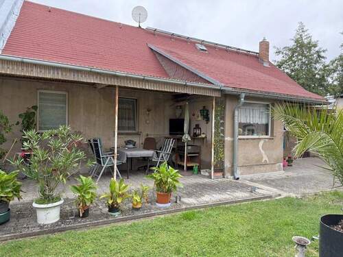 Rückseite mit geschützter Terrasse - 4 Zimmer Einfamilienhaus zum Kaufen in Letschin