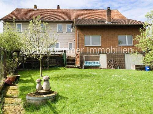 Rückseite mit Anbau - 7 Zimmer Einfamilienhaus zum Kaufen in Delligsen / Varrigsen