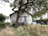 Hausrückseite mit Balkon - 