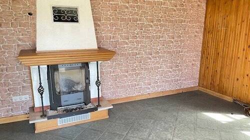 Kamin im Wohnzimmer - Einfamilienhaus mit 115,00 m&sup2; in Neustadt-Glewe zum Kaufen