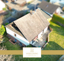 **Schönes Einfamilienhaus mit Garten, Doppelgarage & Loggia mit Panoramaausblick** - Butzbach Bodenrod