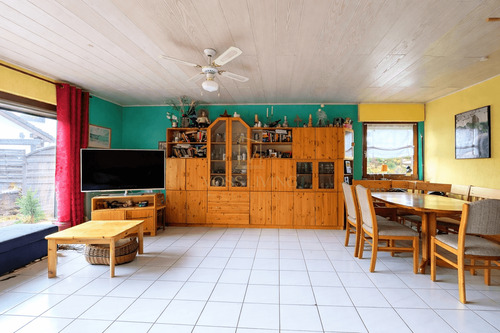 Wohnzimmer EG - 5 Zimmer Einfamilienhaus zum Kaufen in Butzbach