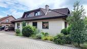 Straßenansicht - Einfamilienhaus mit ELW in guter Lage Nähe Rubbenbruchsee