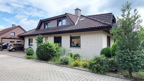 Straßenansicht - Einfamilienhaus mit ELW in guter Lage Nähe Rubbenbruchsee