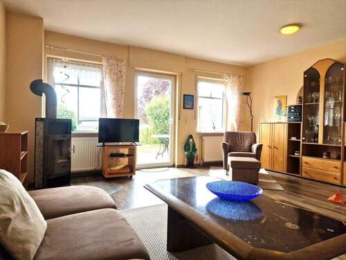 Wohnzimmer mit Kaminofen - 