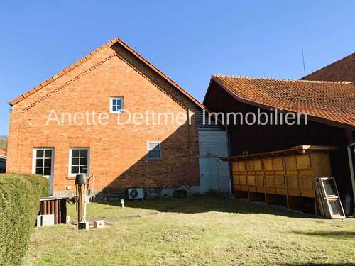 Ansicht Rückseite - Mehrfamilienhaus, Wohnhaus mit 221,50 m&sup2; in Gronau (Leine) zum Kaufen