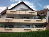 Ansicht Haus - Dachgeschoss-Wohnung mit Ausblick
