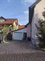 Zufahrt mit Parkmöglichkeit vor Garage 2 - 5 Zimmer Mehrfamilienhaus, Wohnhaus zum Kaufen in Wyhl