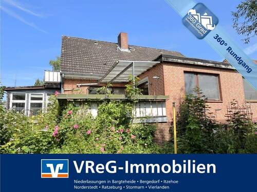 Titelbild - Vollunterkellertes Einfamilienhaus mit Einliegerwohnung und zwei Garagen