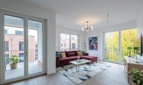 Innenvisualisierung Wohnzimmer - Kurzfristig bezugsfertig: Traumhafte 5-Zimmer-Neubau-Wohnung mit großer Loggia - direkt am Wasser