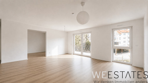  Wohn- und Essbereich mit Zugang zum Balkon - Helle 3-Zimmerwohnung mit Balkon, Stellplatz & Energieklasse A+