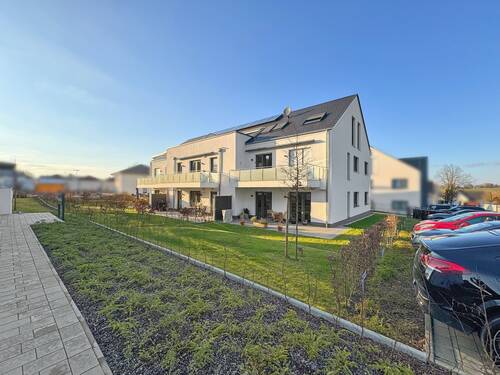 Außenansicht Garten_REFERENZOBJEKT - Energiesparende Obergeschoss-Wohnung - Ihr neues Zuhause wartet!